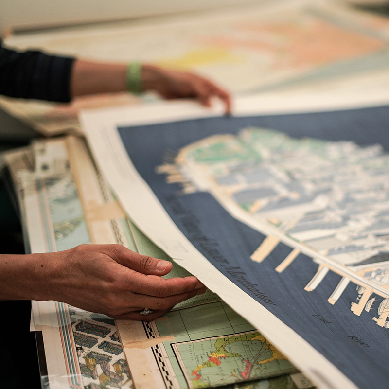 Documents and maps supporting the Climate Fiction Exhibit are photographed in the Earth Sciences and Map Library in McCone Hall on April 2, 2019. 