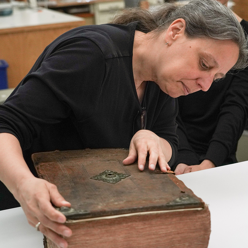 Conservator Erika Lindensmith talks about a King James Bible that will need preservation work  on May 3, 2019.